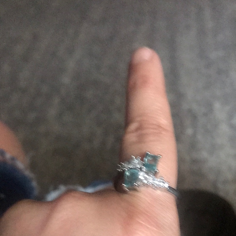 Silver and Blue Gemstone Ring with Elegant Design